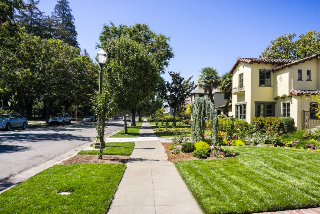 Landscaping Saratoga CA with green lawns and tree-lined streets.