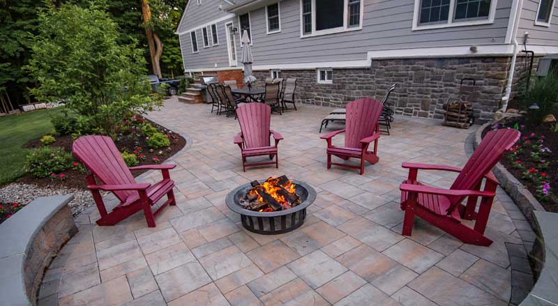 Curved circular patio with a fire pit